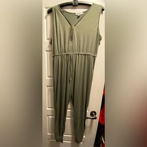Olive colored one piece sleeveless jumpsuit